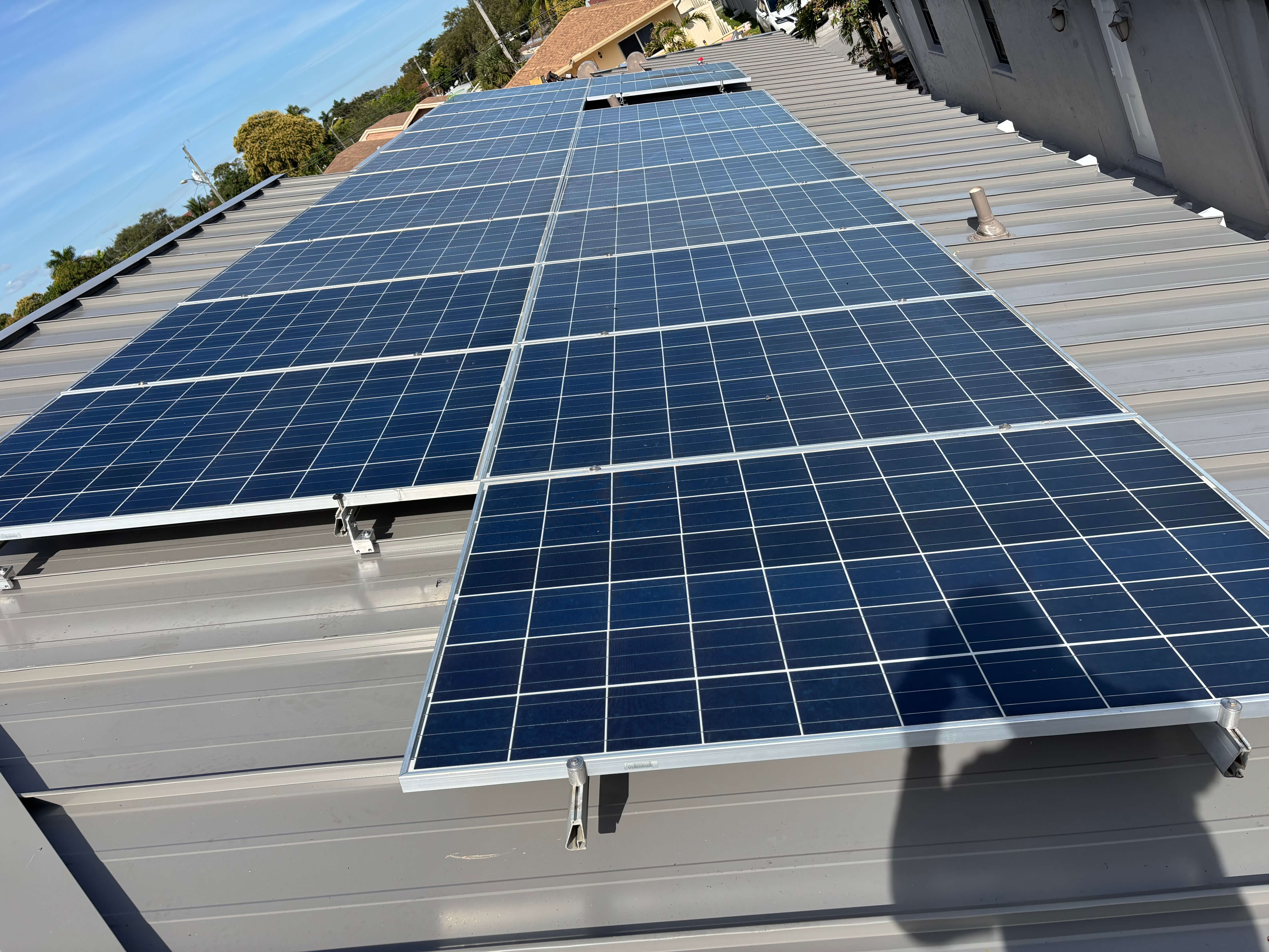 New Finished Roof with Solar in Plantation FL by Smart Roofing Company