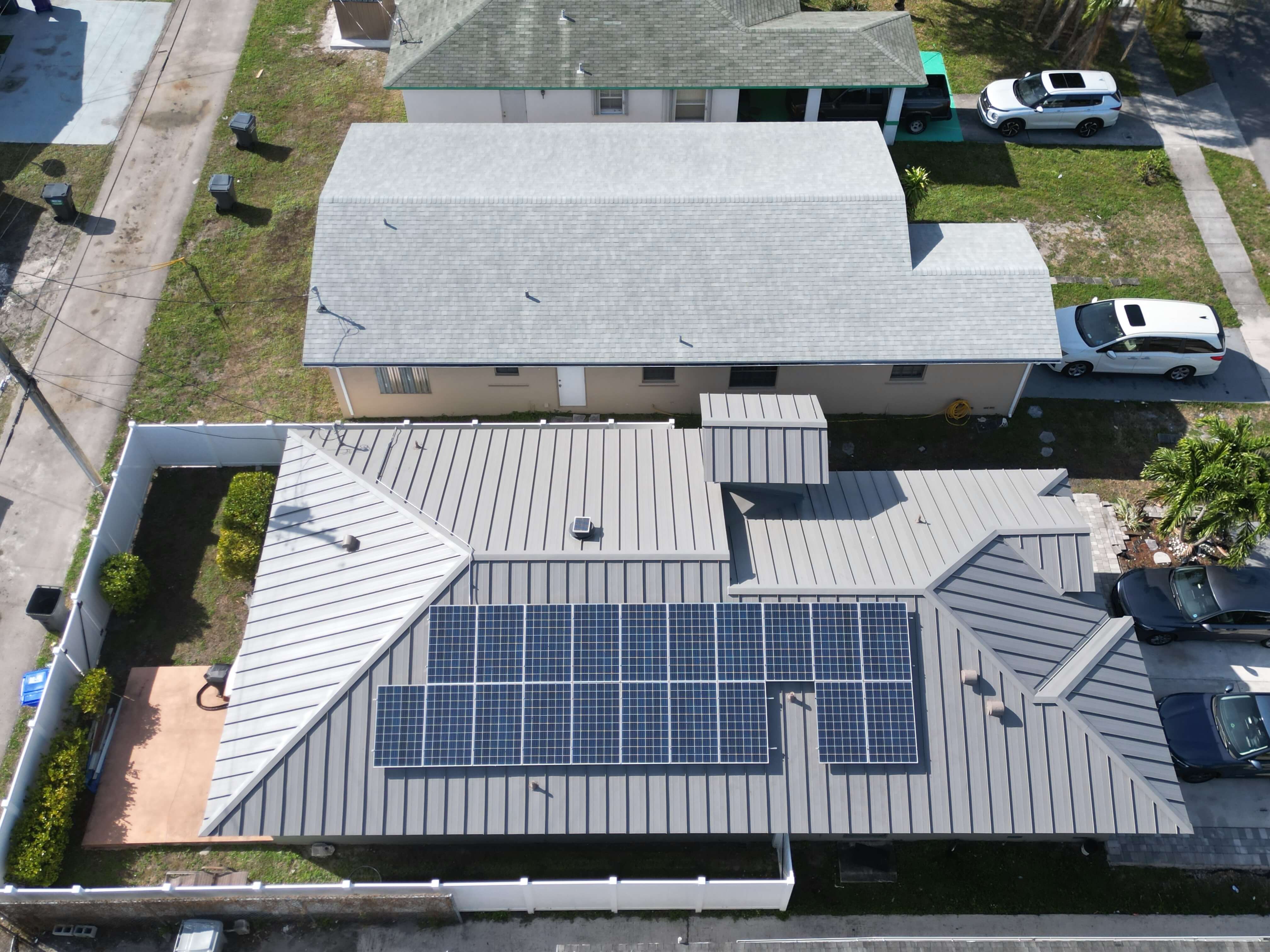finished metal roof and solar panels in fort lauderdale