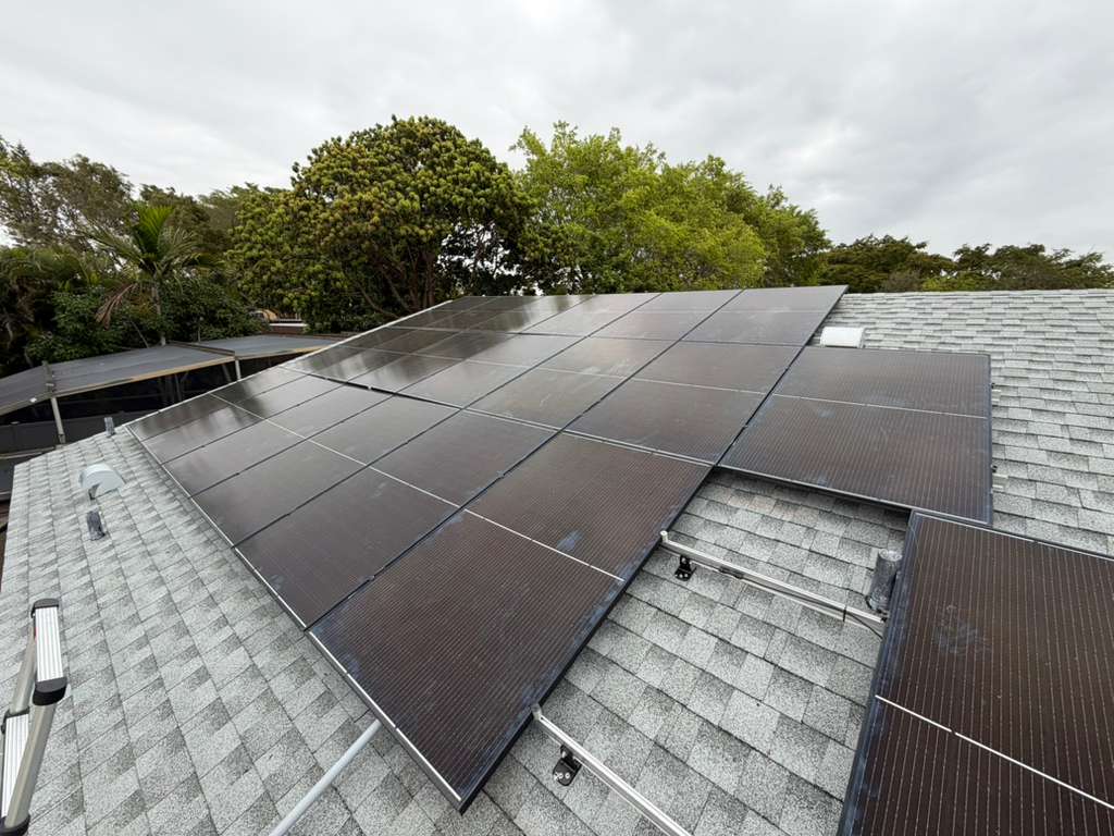 Solar panels on a new shingle roof in South Florida
